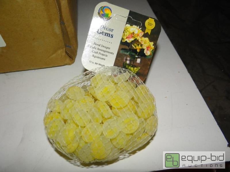 lot 1474 image: Case of 24 bags of Sorbet Lemon decor gems.  ...