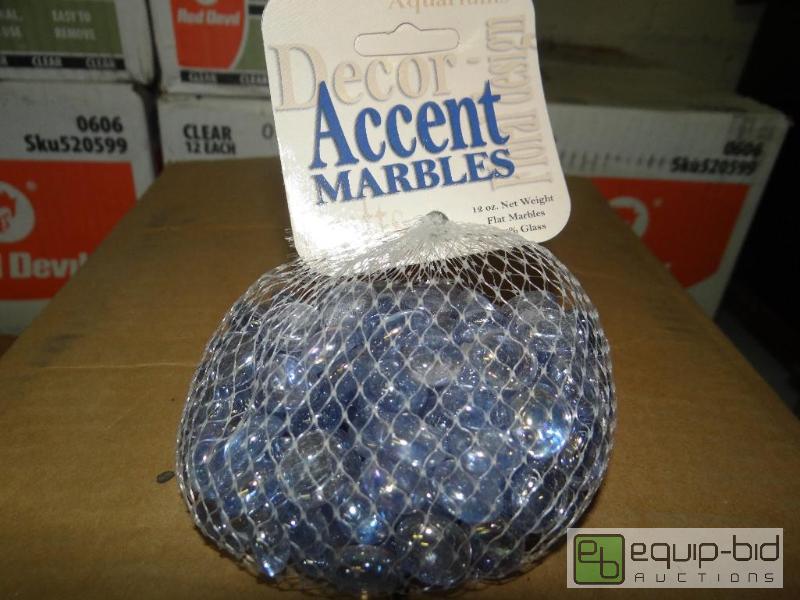 lot 1483 image: Case of 24 bags of DC Lilac Clear decor gems....