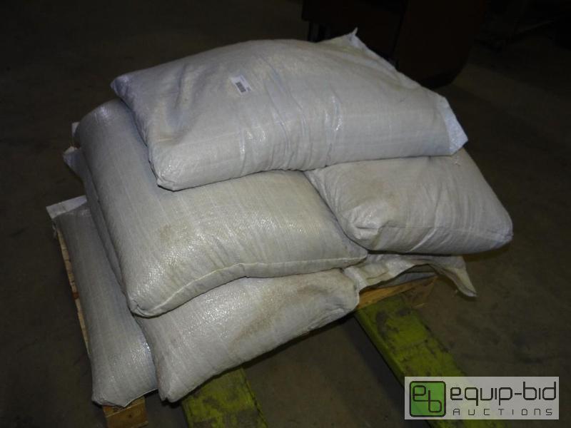 lot 1502 image: Pallet of 7 lg bags of seed. Believed to be n...