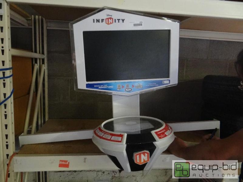 lot 1531 image: Disney Infinity game console display for stor...