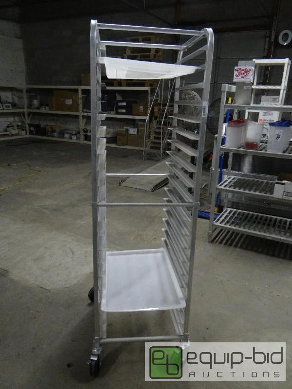 lot 1590 image: Bakery Rack on wheels with 4 trays....