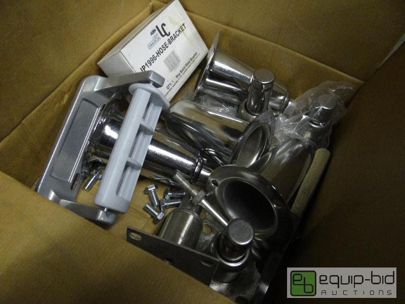 lot 1772 image: Box of new equipment feet and new hose bracke...