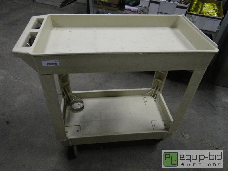 lot 1812 image: Plastic 2 shelf bust cart on wheels with hand...