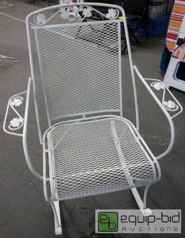 lot 42105 image: A real rocking chair with arm rests and a lit...