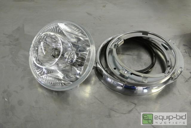 lot 183 image: Harley Davidson Headlight with Bezel Assembly...
