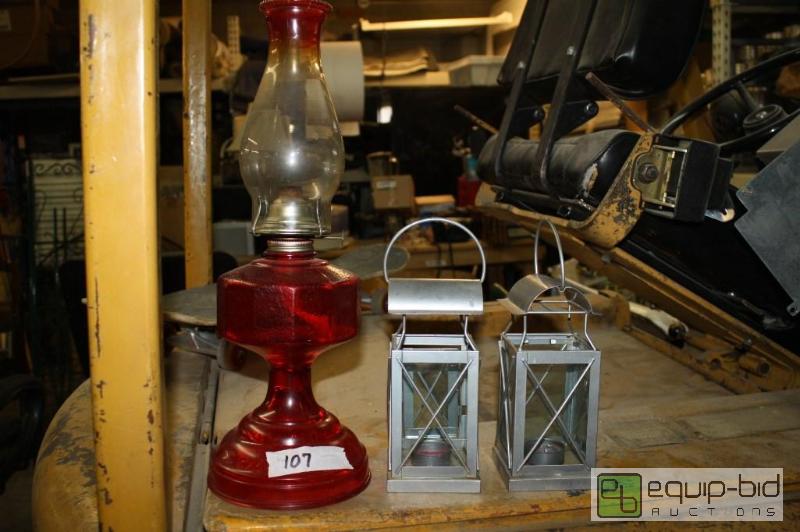 lot 107 image: Lot of 3 1 Oil lamp and 2 candle lanterns...