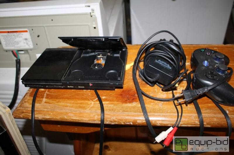 lot 114 image: PS2  1 remote and power cord  will not stay s...