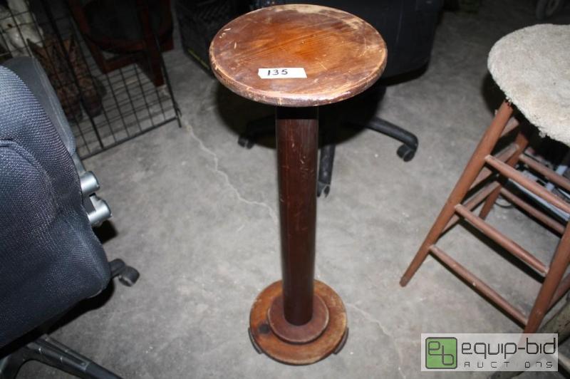 lot 135 image: Round wood table 11 Round 34 12 Tall...