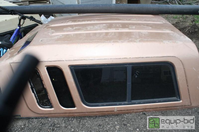lot 219 image: Copper truck camper shell...