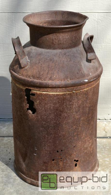 lot 5010 image: Antique Rusted Milk Jug A  Its old. Its rus...