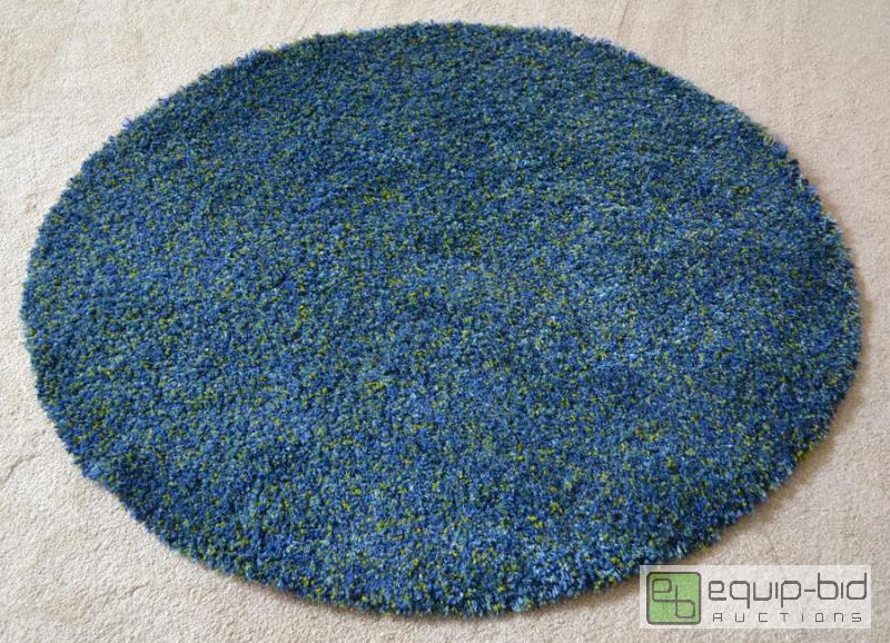 lot 5054 image: Round Blue Rug  This rug was professionally c...