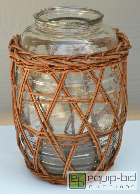 lot 5055 image: Giant Pickle Jar wrapped in decorative wicker...