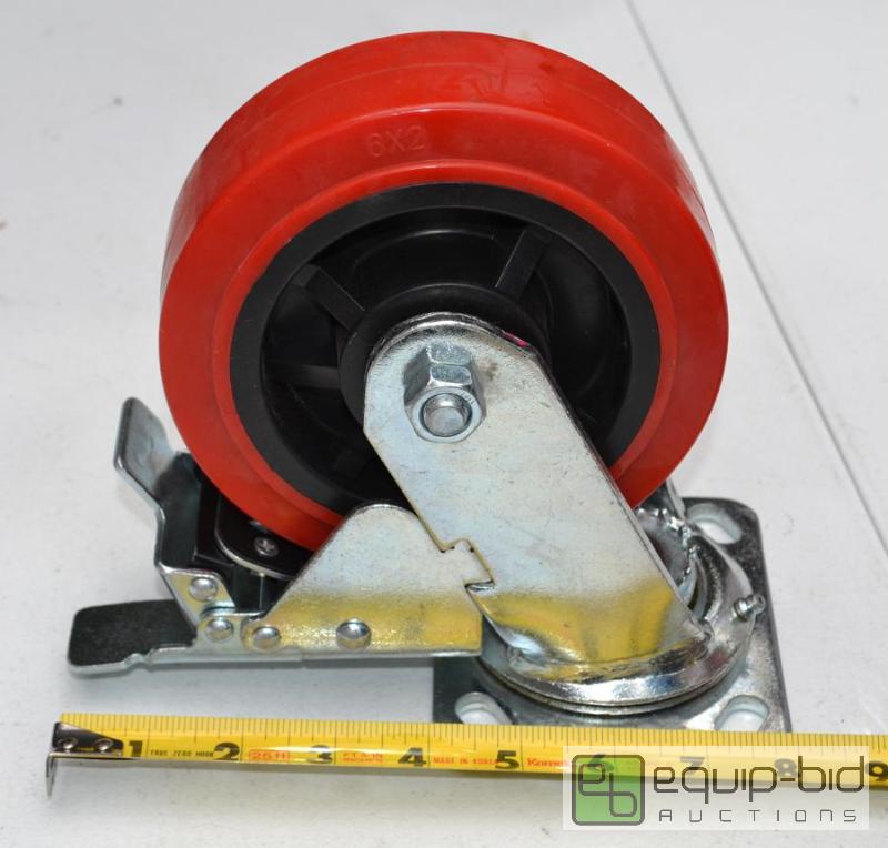 lot 5068 image: 1 large red swivel caster with brake - hard p...