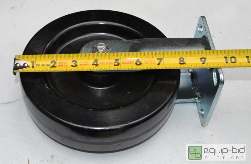 lot 5070 image: 1 large black caster - has a spot for lubrica...