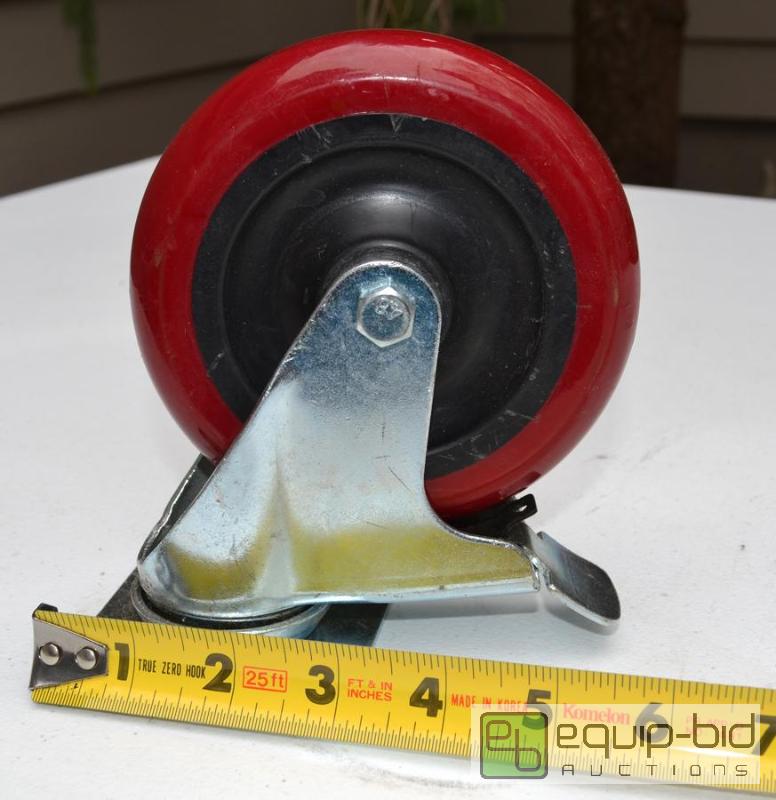 lot 5072 image: 1 large red swivel caster with brake...