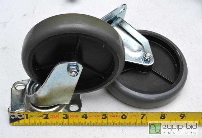 lot 5073 image: pair of large gray and black casters - one sw...