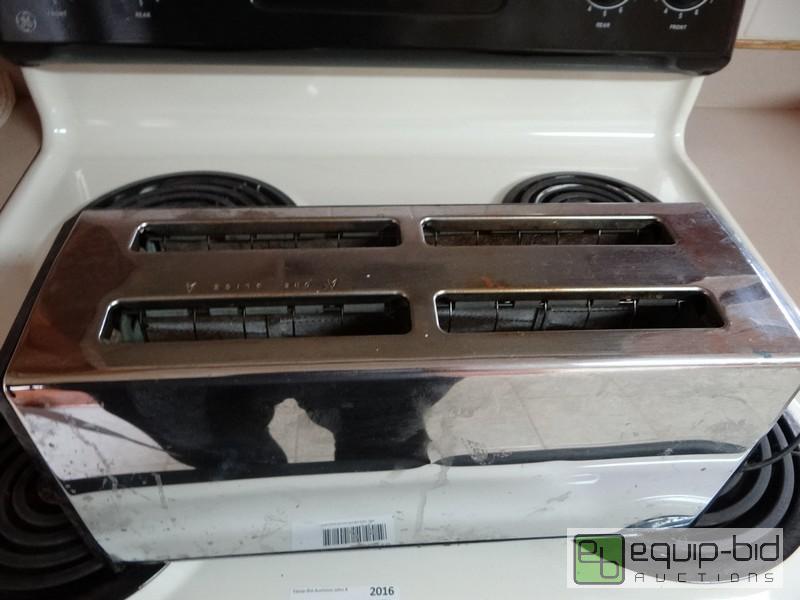 lot 2017 image: Contents Of Cabinet  4 Slice Toaster And Misc...