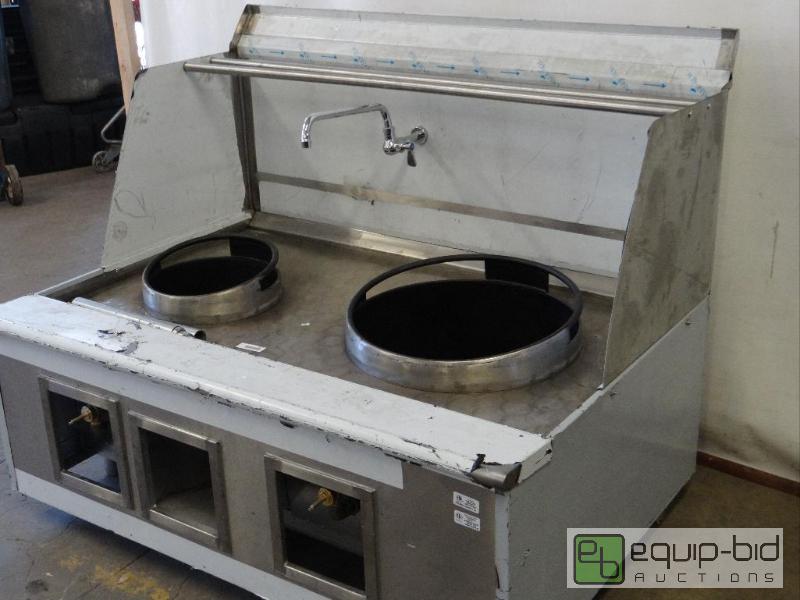 lot 2077 image: Stainless Steel Two Burner Wok with faucet an...