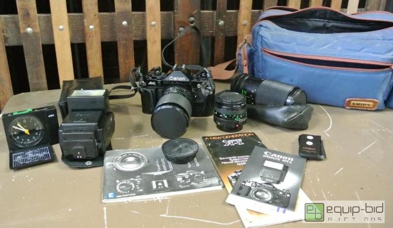 lot 2512 image: Canon A1 Film Slr Camera  Comes with manuels,...
