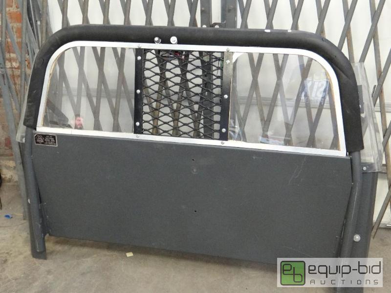 lot 2631 image: Setina Steel and Plexiglass Back Seat Divider...