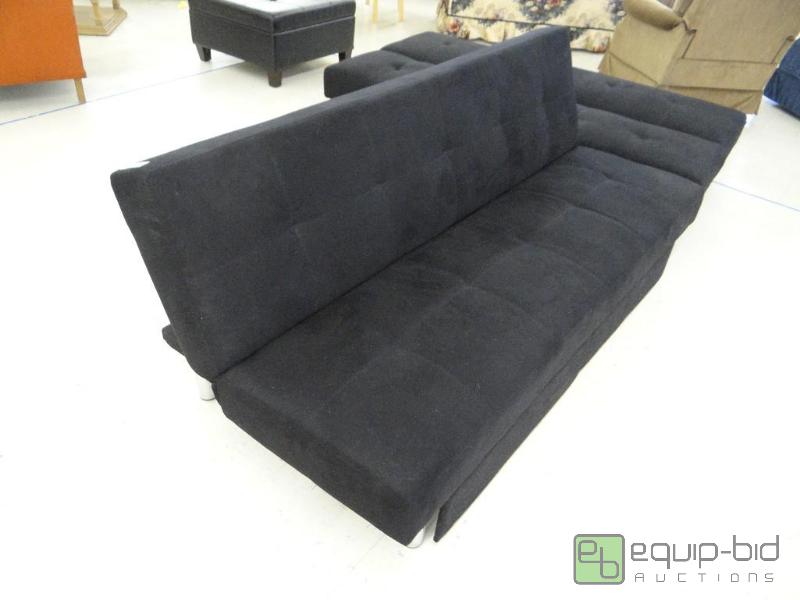 lot 105 image: New futon with under storage.  This new futon...