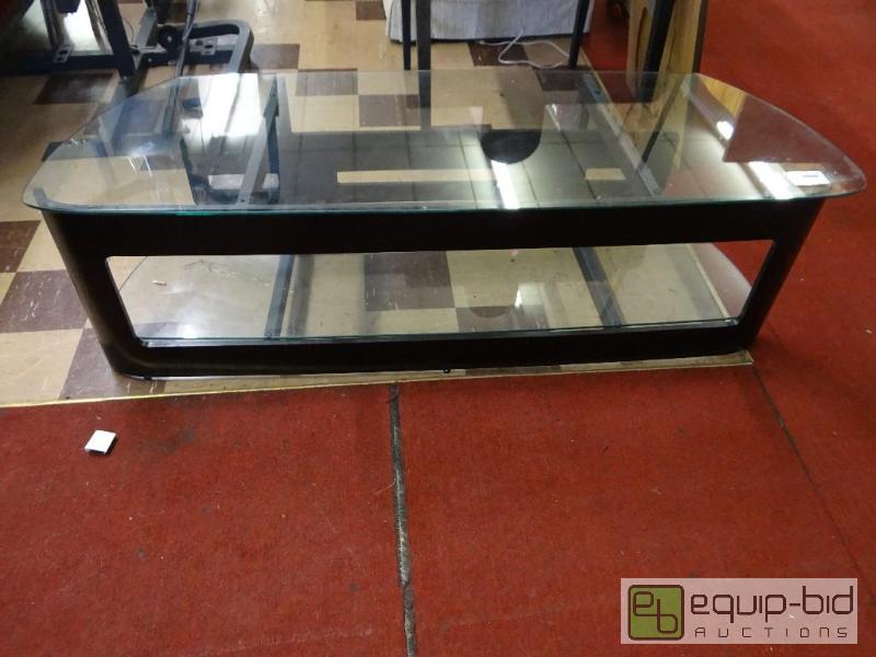 lot 225 image: GLASS TOP TV STAND, VERY NICE MODERN LOOKING,...