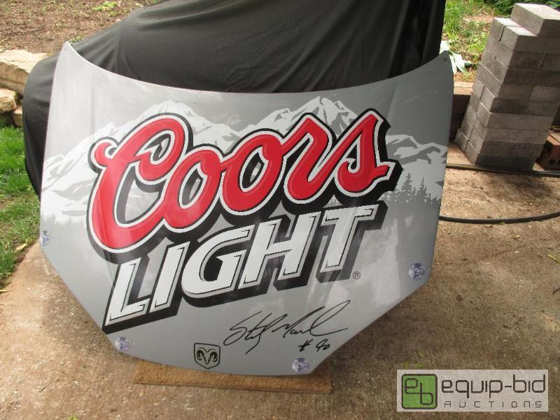 lot 14 image: Coors Light Plastic Hood with Sterling Marlin Signature
