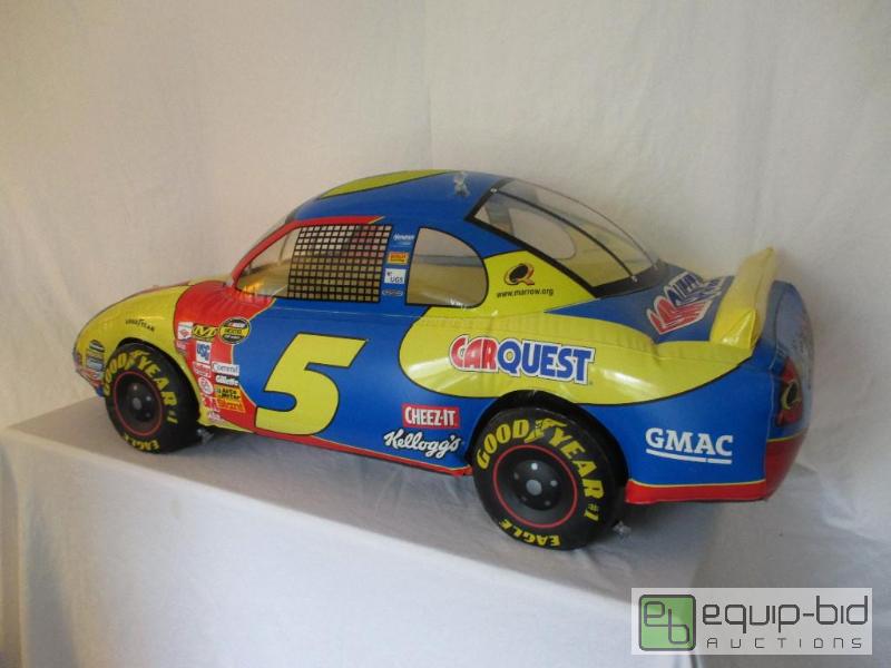 lot 71 image: Two Blow Up Nascar, One Blow Up Baseball, One Life Size Kyle Busch Standup