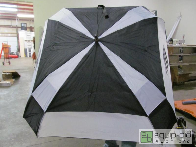 lot 1053F image: Gellas Golf ShedRain Umbrellas Includes Bag R...