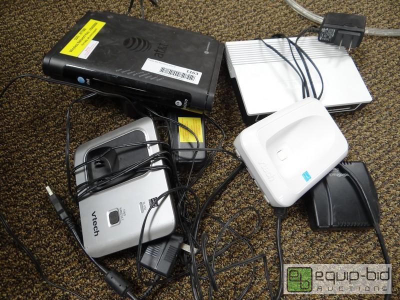 lot 1163 image: Memory Card Reader, DSL Router, Phone Charger...
