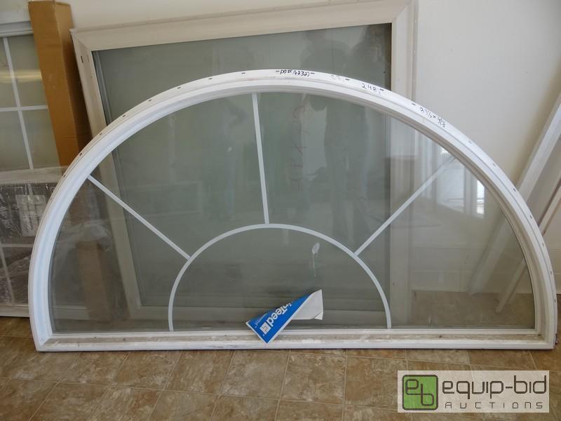 lot 1193 image: New Dual Pane Exterior Arched Window 63.5x41....