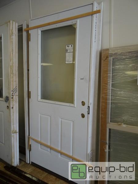 lot 1203 image: New Exterior Steel Sided Door In Frame  36x80...