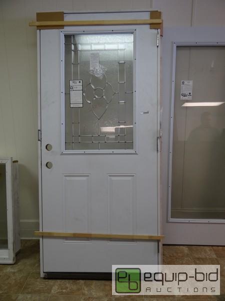 lot 1210 image: New Mid Am Steel Sided Exterior Door In Frame...