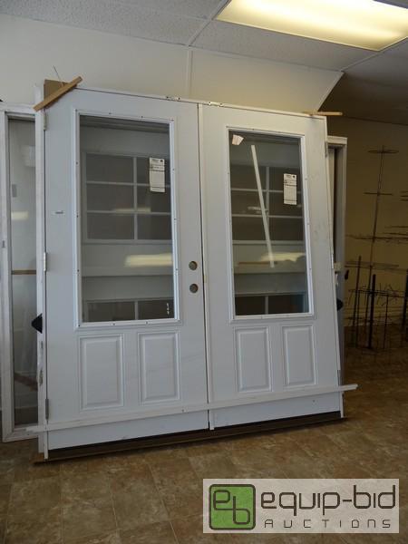 lot 1215 image: New Mid-Am Steel Exterior Door In Frame 74.5x...