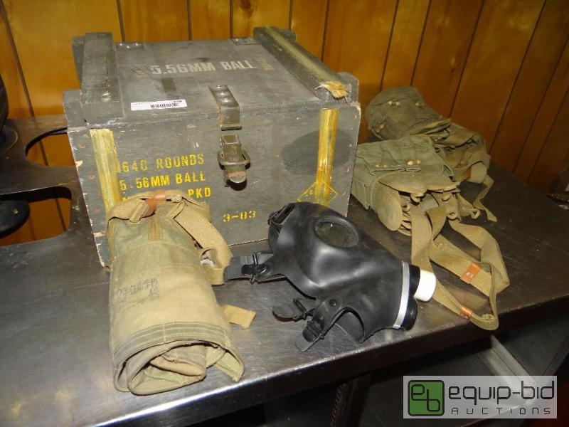 lot 449 image: Military ammo box with military items include...