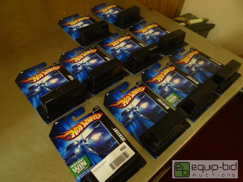 lot 466 image: Lot of 10 Hot Wheels mystery cars. In package...