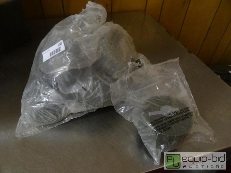 lot 480 image: Bag full of new in package gas mask filters....
