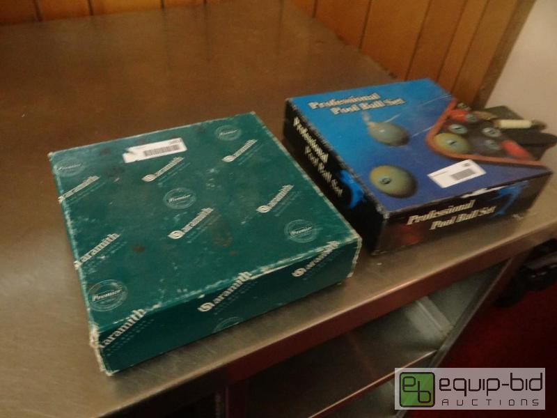 lot 498 image: Lot of 2 boxes of billiards balls. Not comple...