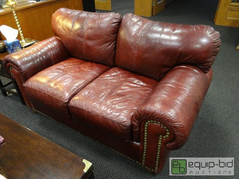 lot 514 image: Beautiful burgundy loveseat.  High end love s...