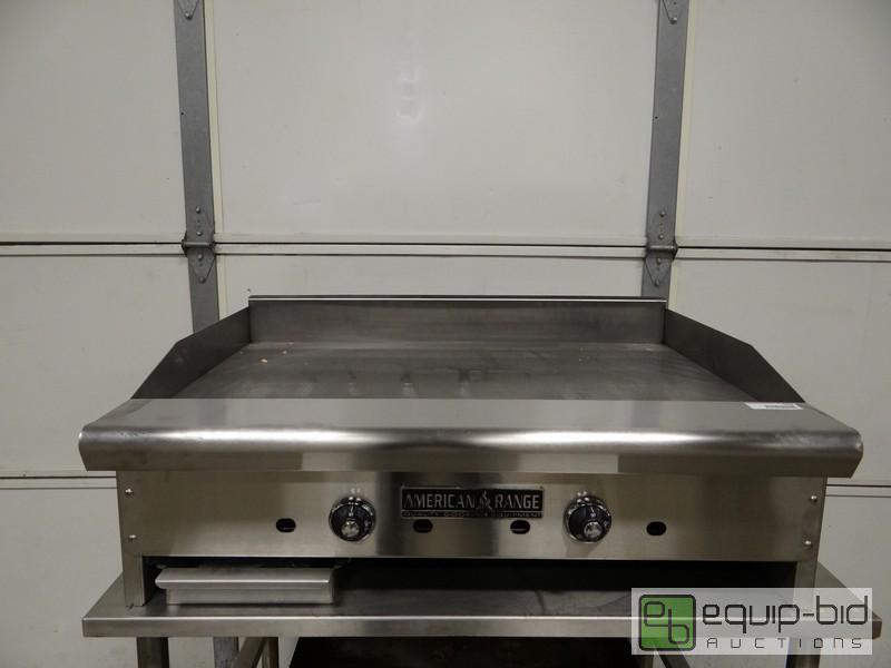 lot 1008 image: Brand New American Range 36 inch Flat Top  M...