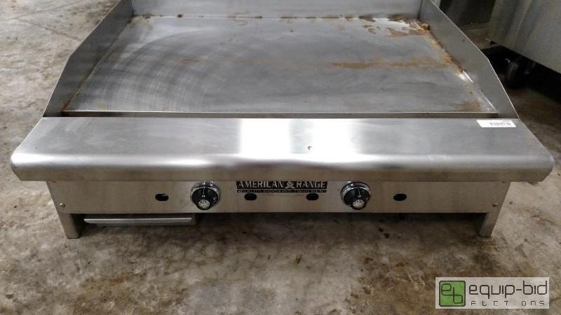 lot 1009 image: Brand New American 36 Inch Range Flat Top The...