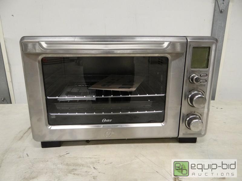 lot 1052 image: New Stainless Steel Oster Toaster Oven Model...