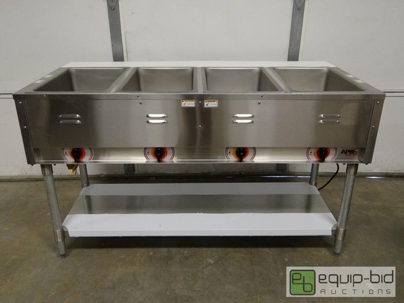 lot 1069 image: Brand New APW Wyott 4 Sealed Well Steam Table...