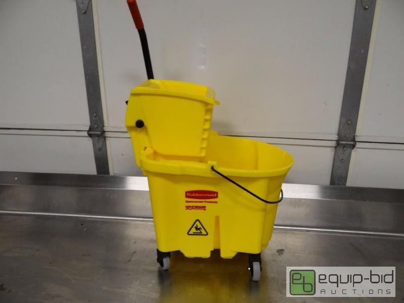 lot 1108 image: Brand New Rubbermaid Poly Mop Bucket On Caste...