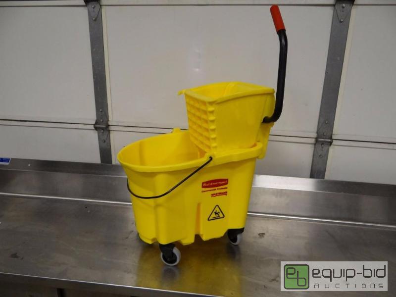 lot 1109 image: Brand New Rubbermaid Poly Mop Bucket On Caste...