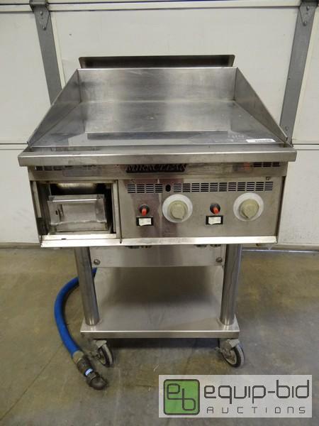 lot 1221 image: Miraclean Flat Top Grill on Casters Model 24...