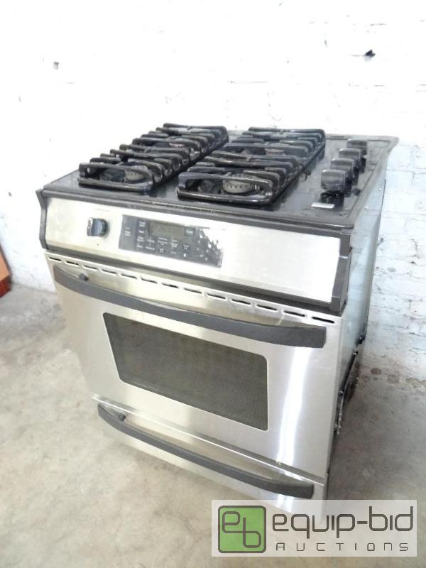 lot 1053 image: Kenmore Elite Duel Fuel Four Burner Range and Convection Oven