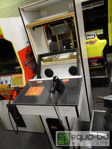 lot 558 image: First Person Shooter Game Console Cabinet  Ne...
