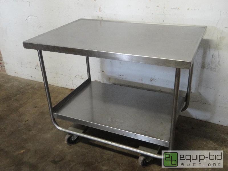 lot 1126 image: Stainless Steel Table with Under Shelf on Casters