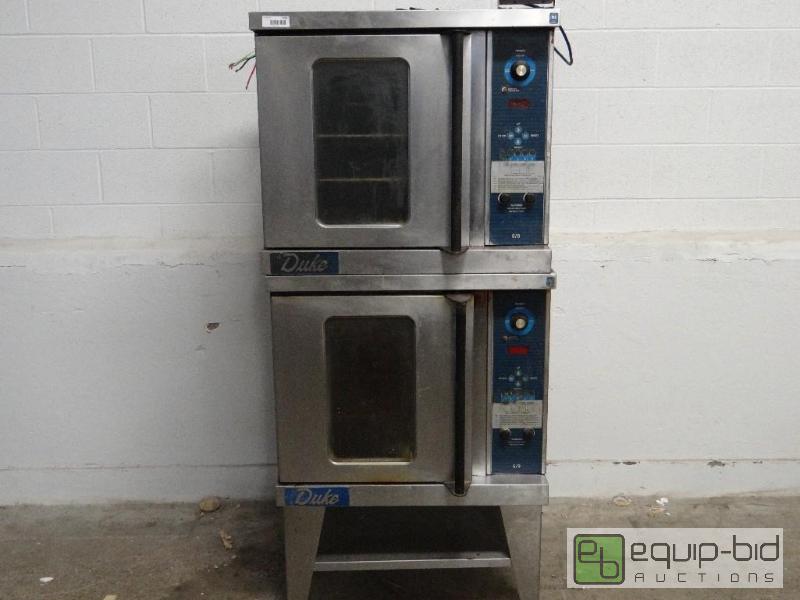lot 1193 image: Duke Electric Double Stack Half Size Convection Ovens